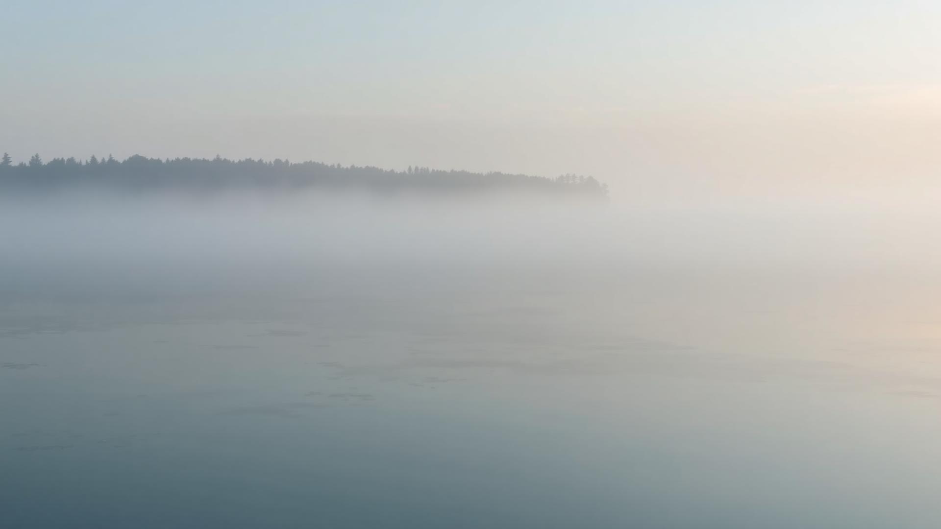 Misty dawn over the calm Penobscot River